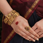 92.5 Silver Temple Kada Bangles with Krishna & Peacock Motifs by Tavya Jewellery - close-up detail