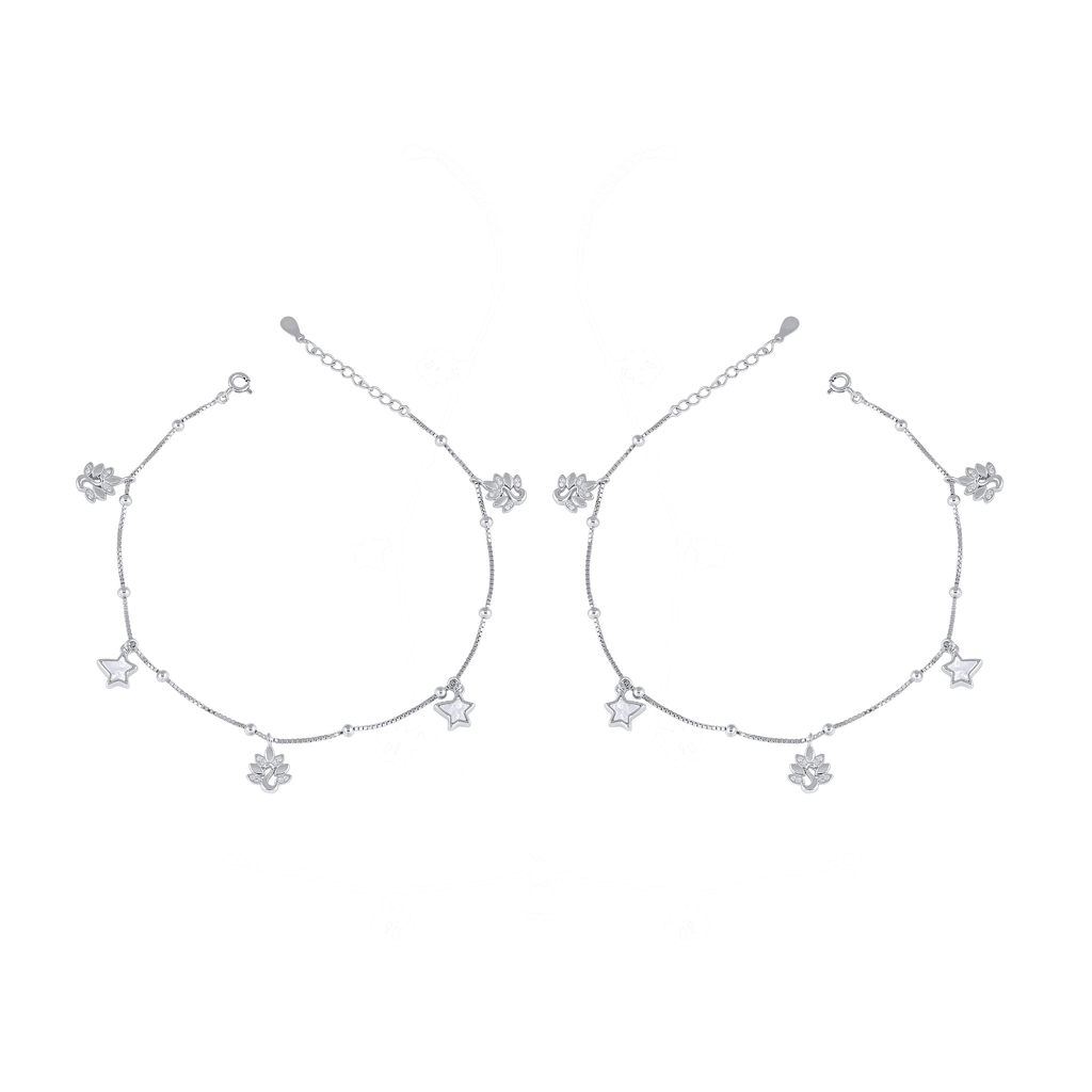 Silver Flora Dangle Anklet featuring sterling silver floral charms with a delicate cable chain and dainty dangling design.