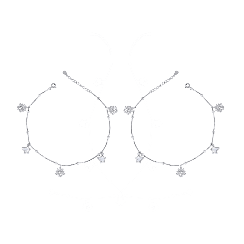 Celestial Bloom silver charm anklet with star and floral charms on a delicate 92.5 sterling silver chain, polished finish.