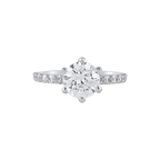 Silver Pave-Set Band Ring featuring a round clear center stone with pavé-set smaller stones on a polished silver band
