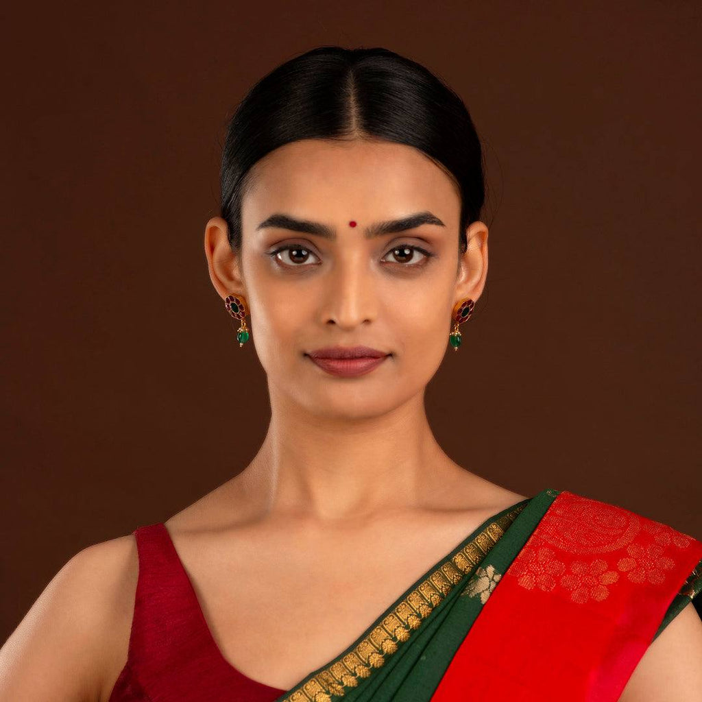 92.5 Silver Gold Plated Floral Earrings by Tavya Jewellery - styled close-up