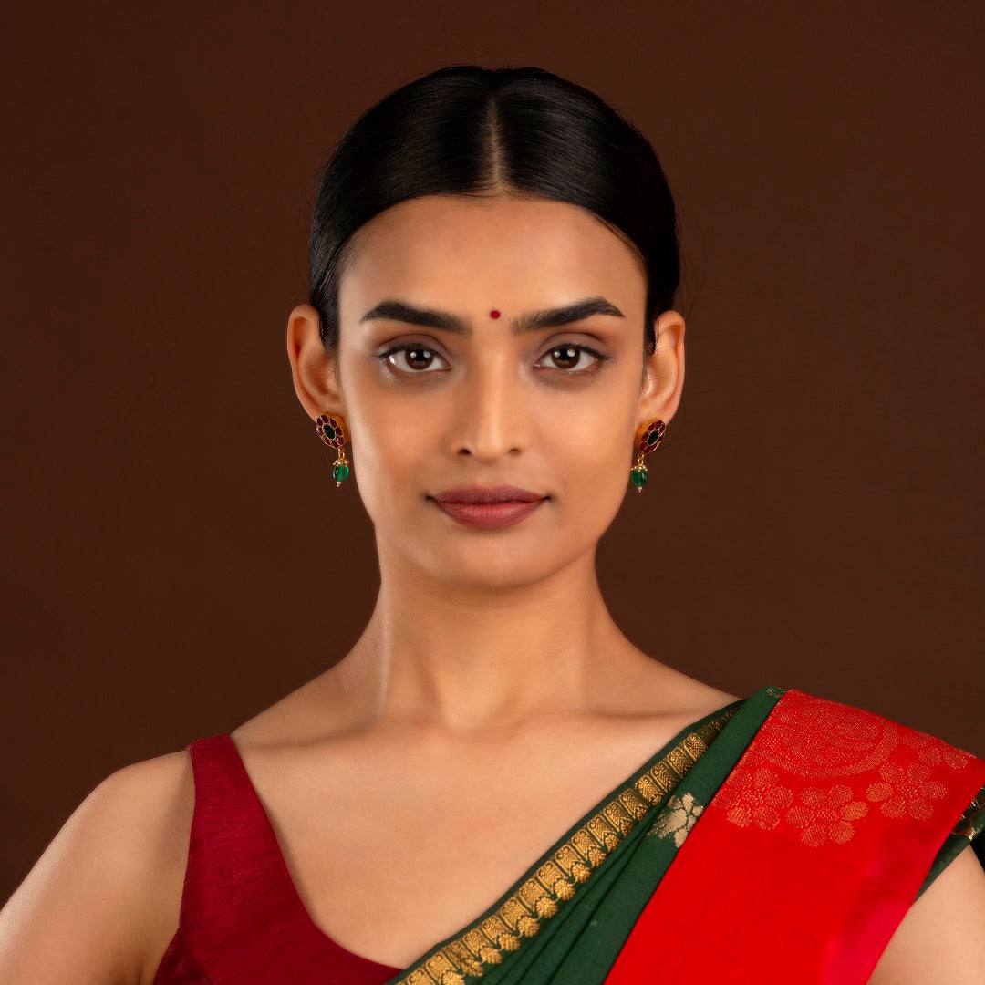 92.5 Silver Gold Plated Floral Earrings by Tavya Jewellery - styled close-up