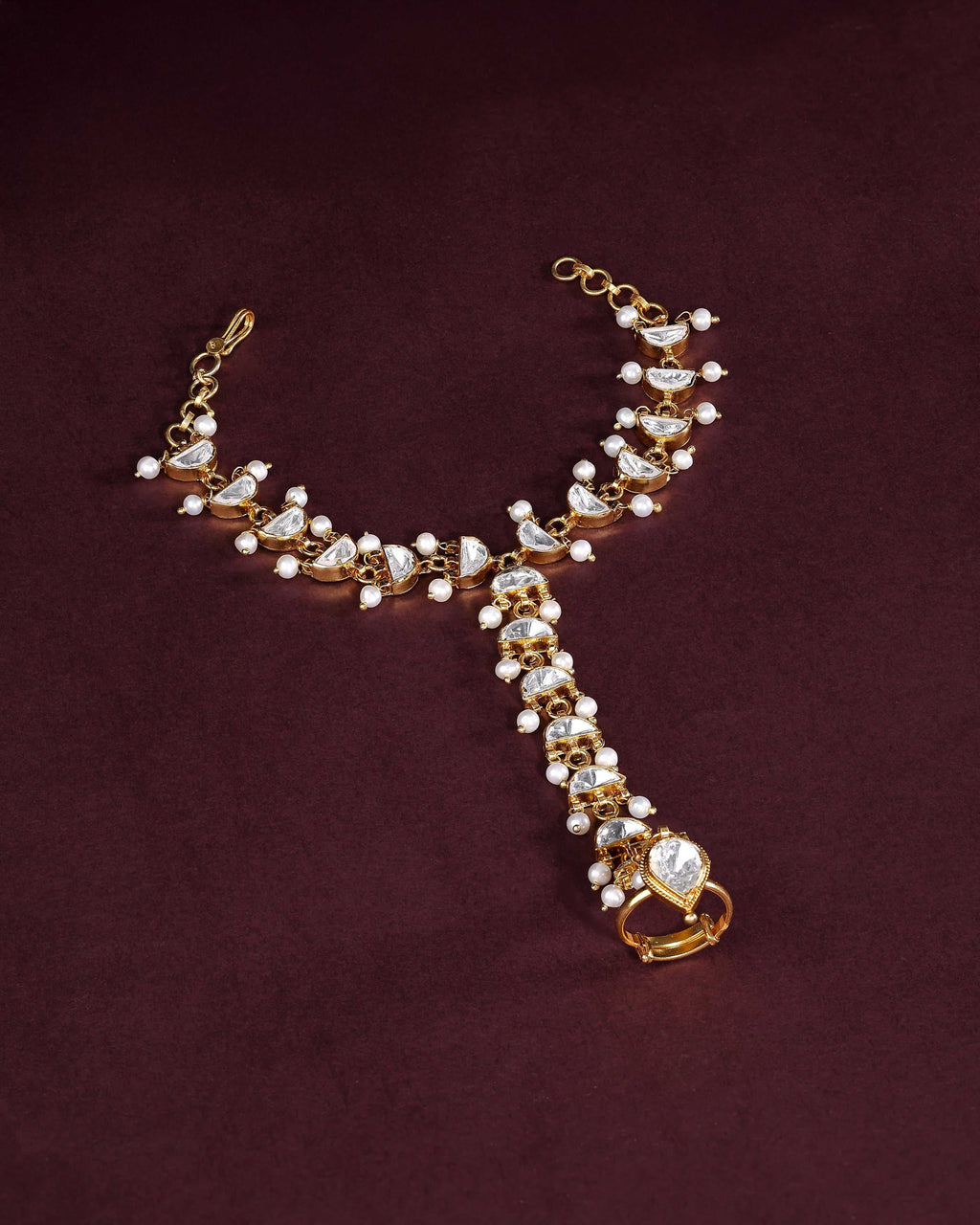Silver Kundan Haath Phool with Delicate Pearl AccentsSilver Kundan Haath Phool