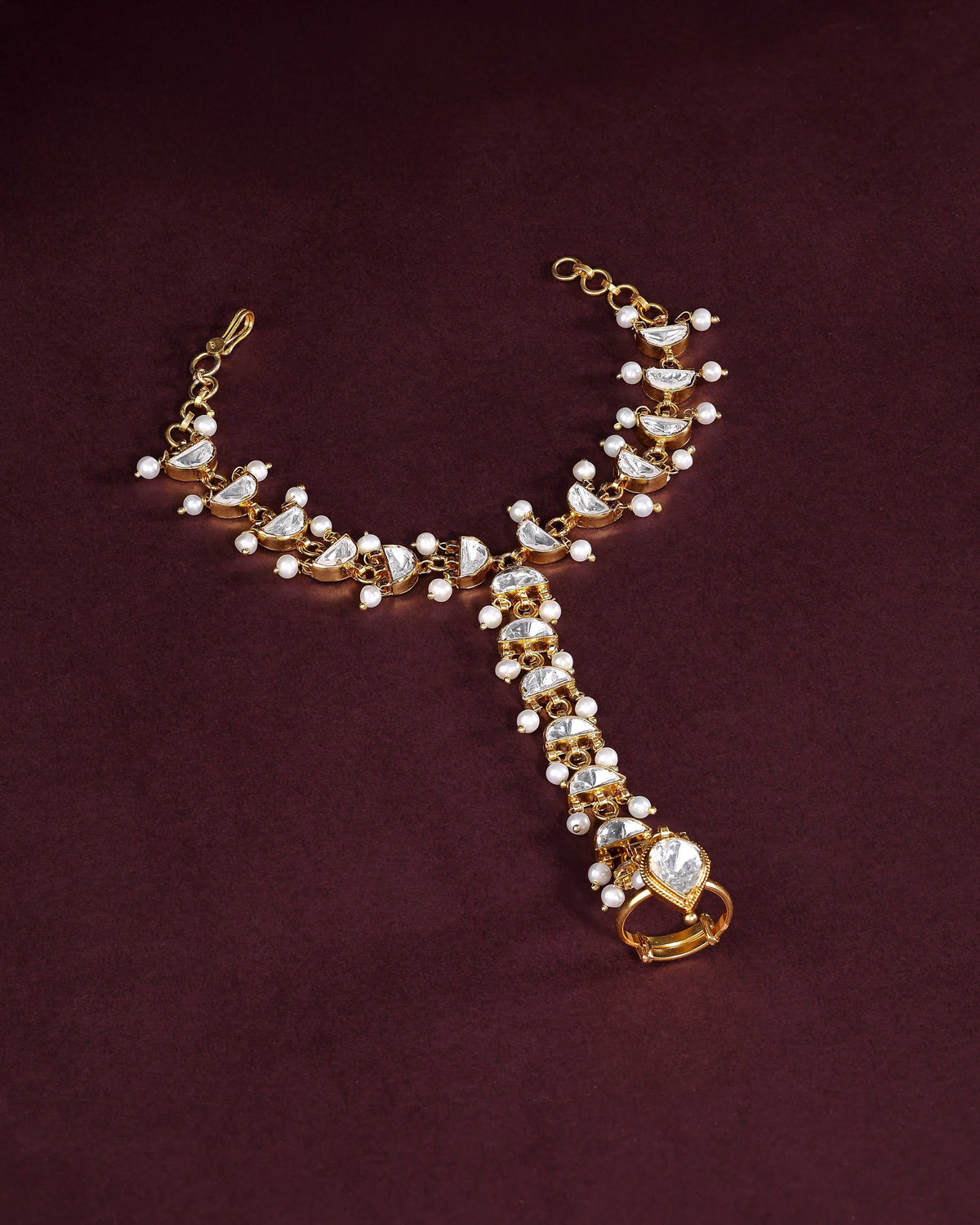 Silver Kundan Haath Phool with Delicate Pearl AccentsSilver Kundan Haath Phool