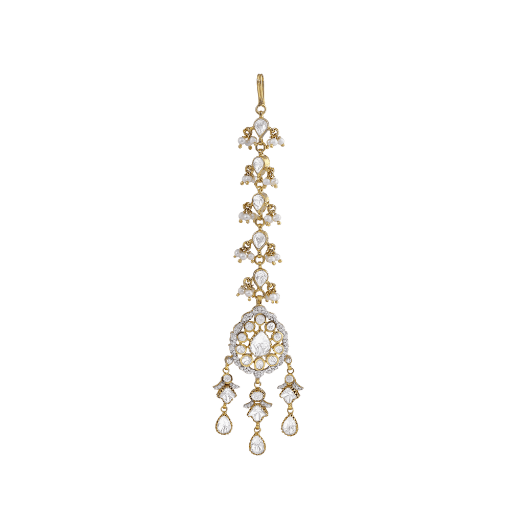 Silver Maang Tikka featuring gold-tone metal with pear-cut white stones and intricate seed pearl cluster embellishments in a linear drop design.