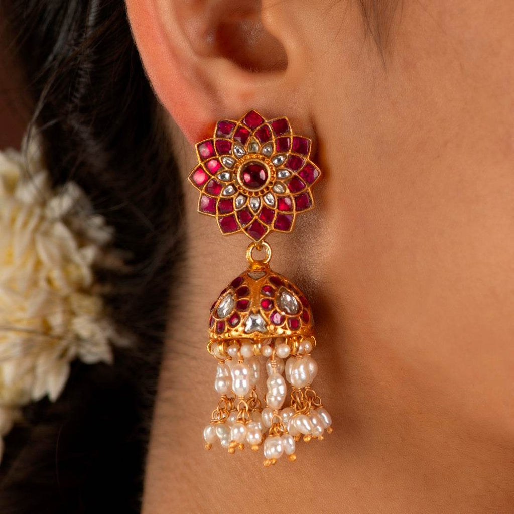 Silver Jhumkas With Floral Pattern by Tavya Jewellery - side view
