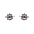 Lotus-bloom toe rings with a red center stone in oxidized Pure 92.5 Silver featuring floral detailing and open bands.