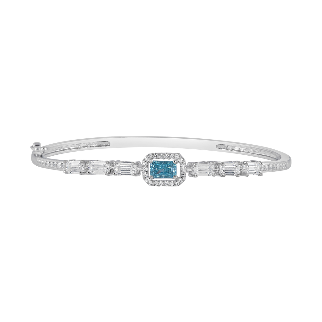 Arctic Blue Halo silver bracelet with a vibrant blue rectangular center stone, surrounded by pave and baguette clear crystals.