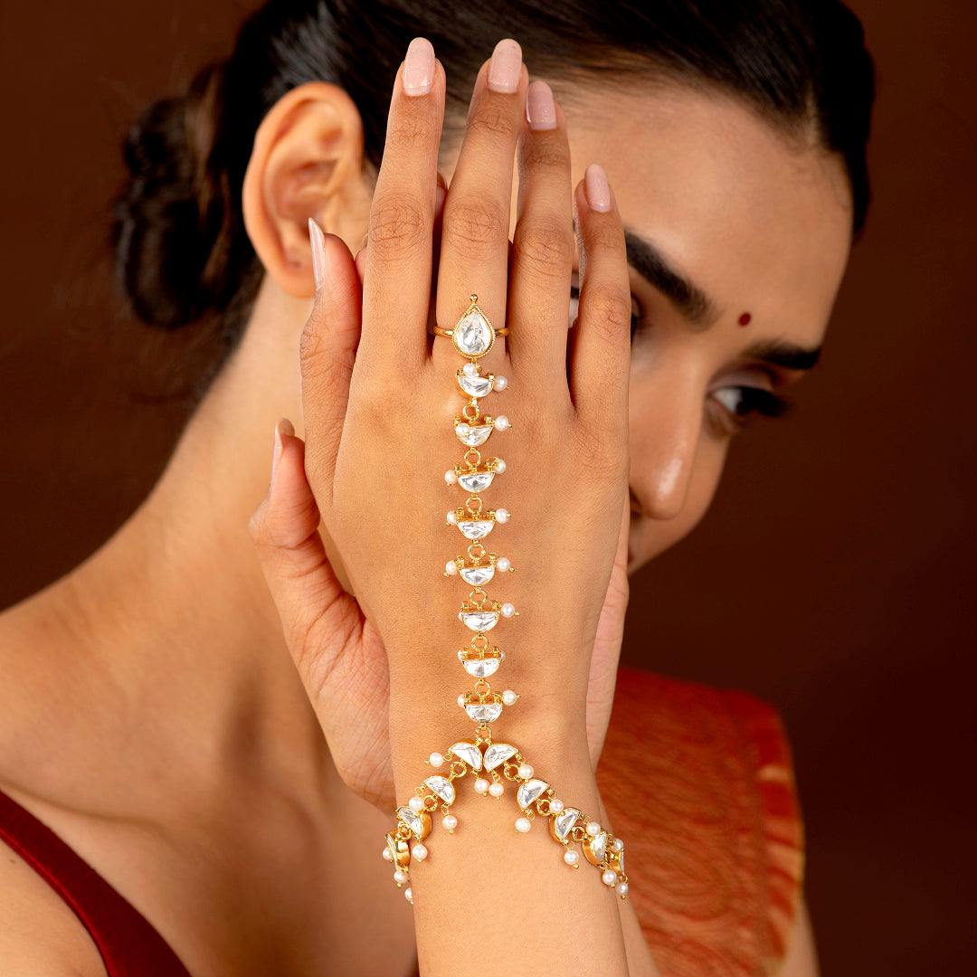 Silver Kundan Haath Phool with Delicate Pearl AccentsSilver Kundan Haath Phool