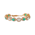 Gold Plated Silver bracelet featuring oval green stones and clear Polki crystals in ornate moon-shaped settings with micro-CZ accents.