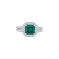 Green Cushion-Cut Halo Ring featuring a vibrant green gemstone surrounded by a sparkling silver pavé halo and split-shank band.