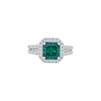 Green Cushion-Cut Halo Ring featuring a vibrant green gemstone surrounded by a sparkling silver pavé halo and split-shank band.
