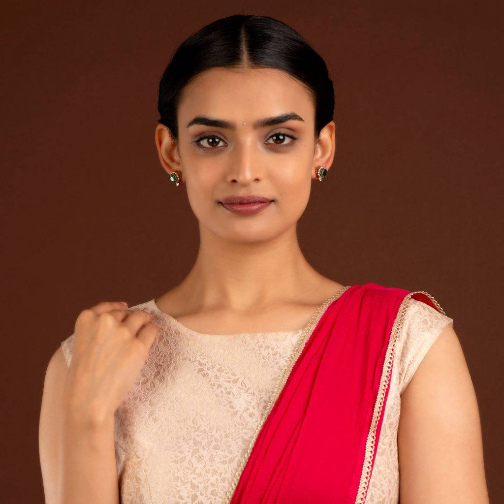 Regal Green Stone CZ Halo Studs in Silver by Tavya Jewellery - styled close-up