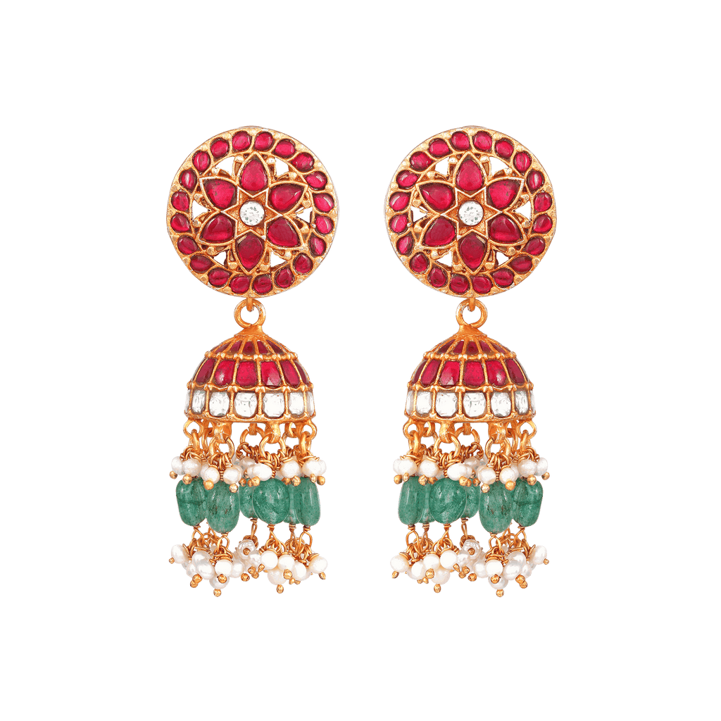 Floral Kundan Pattern silver jhumkas with ruby red stones, white kundan detailing, green beads, and pearl tassels.