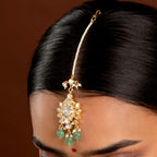 Silver Maang Tikka with Pearls and Green Beads by Tavya Jewellery - styled close-up