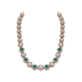 92.5 Silver Necklace featuring alternating green and white stones, each surrounded by a sparkling halo in a vintage-inspired design.