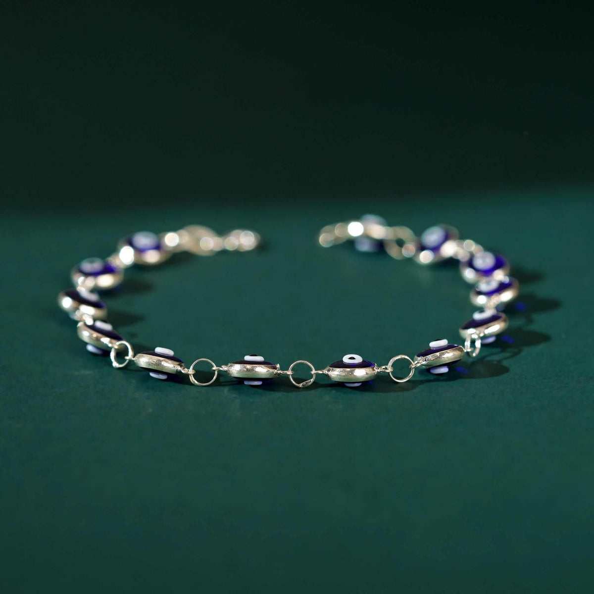 Minimalist Blue Enamel Evil Eye Bracelet in Pure 92.5 Silver by Tavya Jewellery - close-up detail