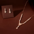 Rose Gold Floral Drop Set by Tavya Jewellery - front view