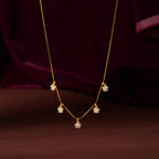 Gold Floral Drop Chain by Tavya Jewellery - close-up detail