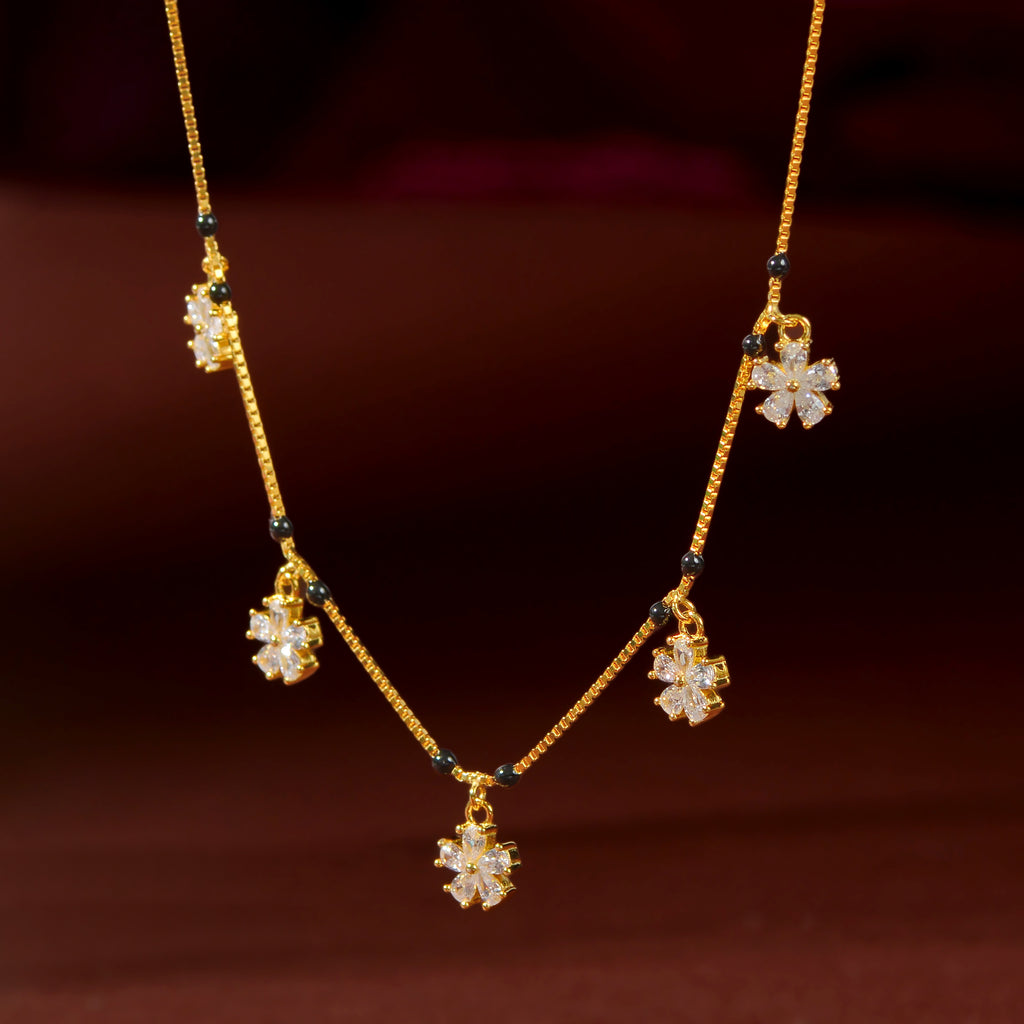 Gold Floral Drop Chain by Tavya Jewellery - front view