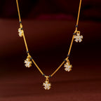 Gold Floral Drop Chain by Tavya Jewellery - front view