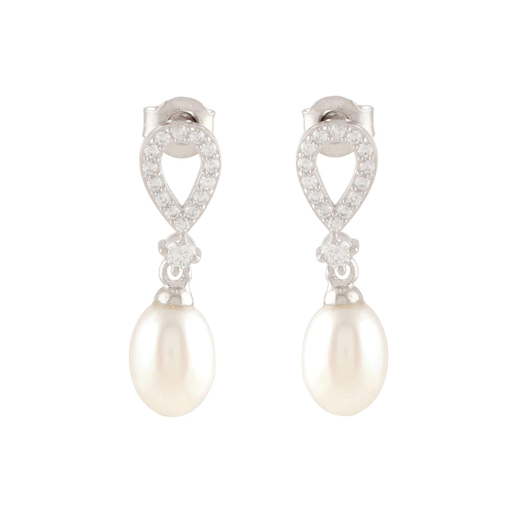White Pearl Drop Earrings featuring teardrop-shaped silver studs with sparkling stones and dangling oval pearls.