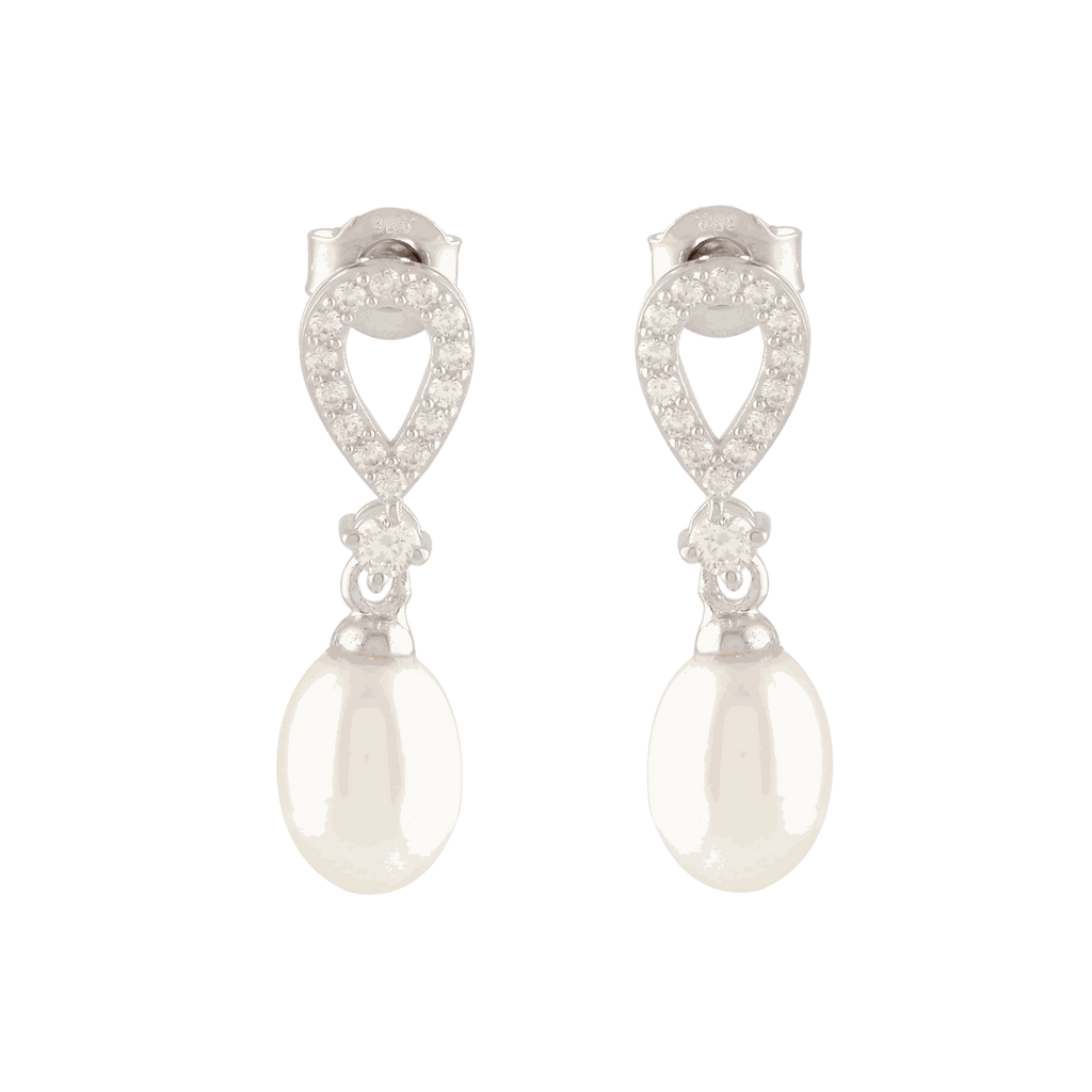 White Pearl Drop Earrings Adorned with Sparkling Stones by Tavya Jewellery - styled close-up
