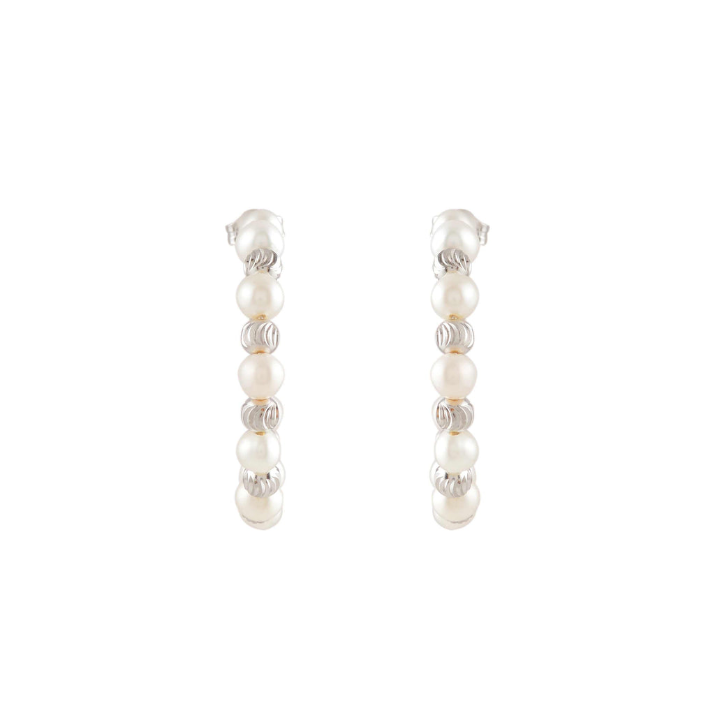 Orbit Pearl Stud Earrings featuring a vertical row of white pearls and silver textured accents in a compact design.