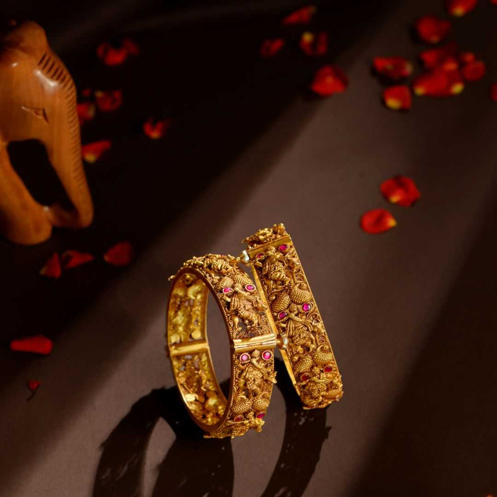 92.5 Silver Temple Kada Bangles with Krishna & Peacock Motifs by Tavya Jewellery - front view