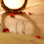 White Sparkling Silver CZ Leaf Ear Climbers by Tavya Jewellery - front view