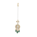 Silver Maang Tikka featuring a starburst pattern with clear stones, green beads, and a pearl-linked chain with gold accents.