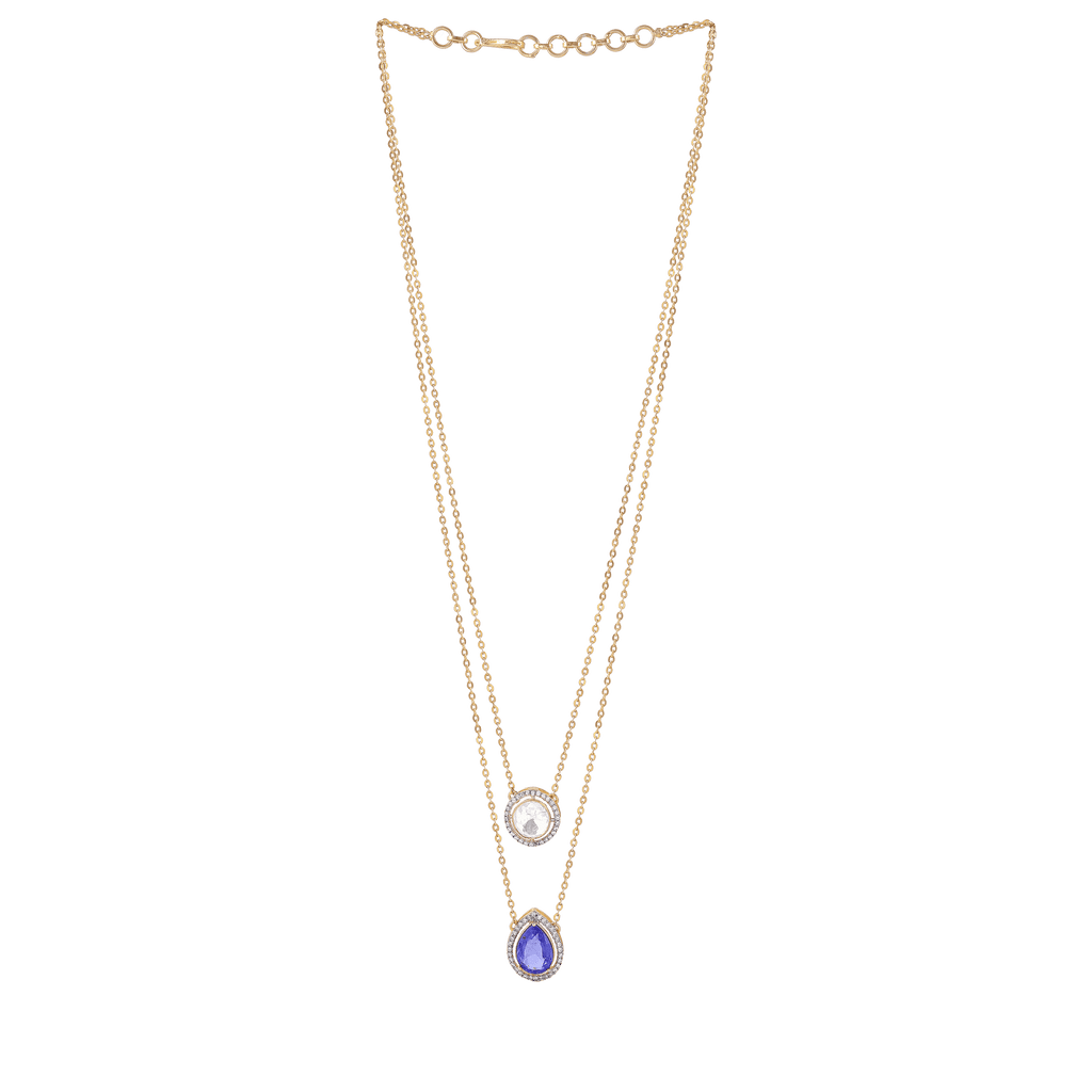 Halo Double-Layered Necklace in gold-tone metal featuring a round clear stone and a blue teardrop pendant with a halo border.