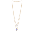 Halo Double-Layered Necklace in gold-tone metal featuring a round clear stone and a blue teardrop pendant with a halo border.