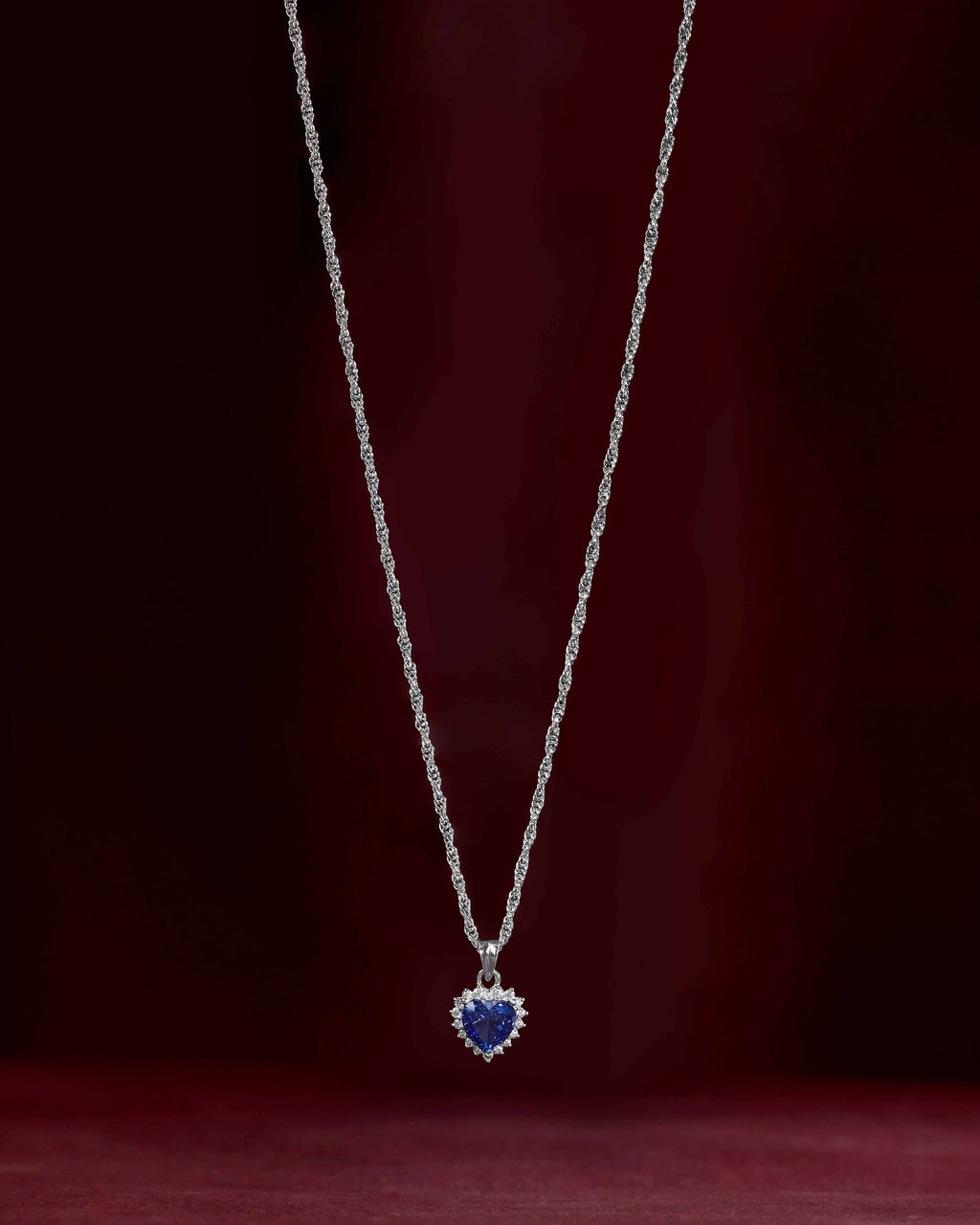 Deep Blue Heart Halo Silver Necklace by Tavya Jewellery - close-up detail